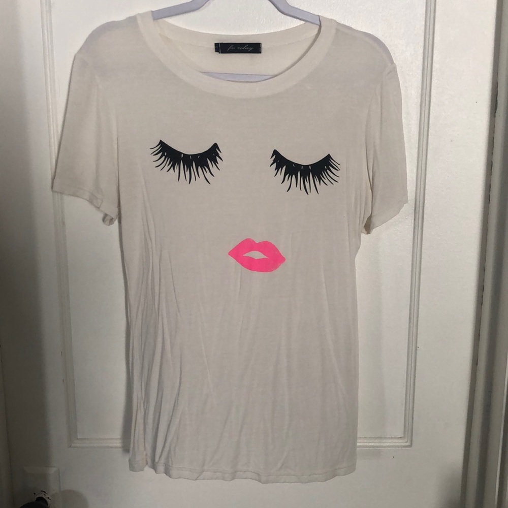 Woman’s silky shirt with lashes and lips